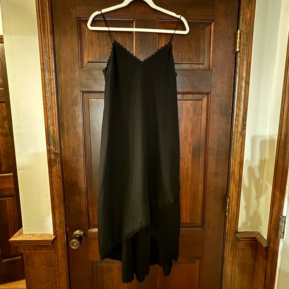 Club Monaco black silk dress. Never worn. Size 0. High low style.